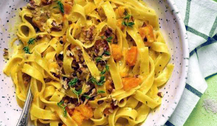 Tagliatelle di zucca con pancetta croccante e Grana Padano: un’esperienza autunnale indimenticabile