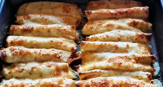Crepes farcite al forno: un antipasto invitante e soddisfacente